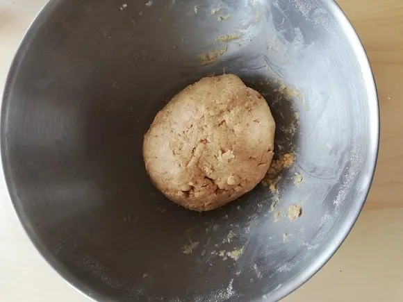 a vanilla cookie dough ball in a bowl