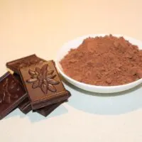 an image of 70% dark chocolate and a bowl of pure cocoa powder