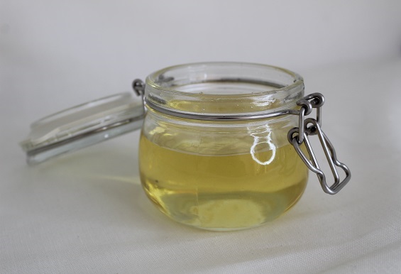 an opened jar with agave nectar