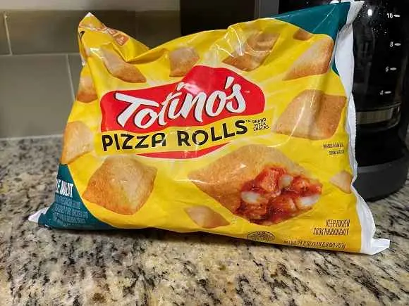 a bag of frozen totino's pizza rolls on a table