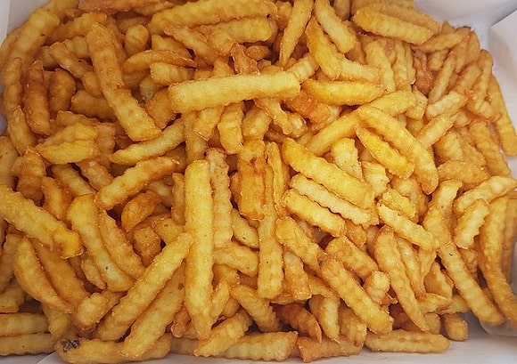 a big portion of freshly fried french fries