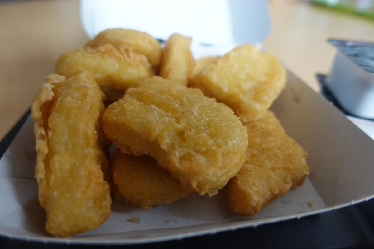 a serving of mcdonald's chicken nuggets in a box